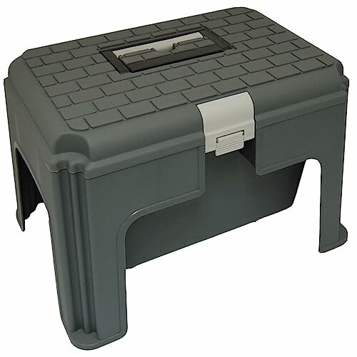 A folding step stool with a handle on top.